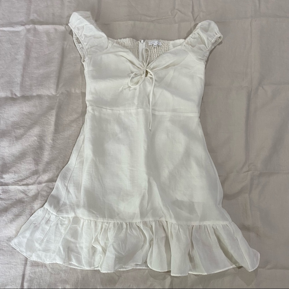 White smocked puff-sleeve mini dress